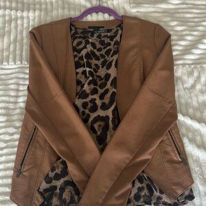 Faux leather jacket with short sleeve sheer top